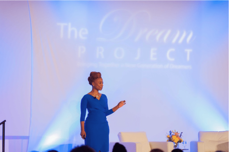 Founder and CEO of Egami Consulting Group, Teneshia Jackson-Warner welcomes attendees at The Dream Project Symposium April 16-17, 2015