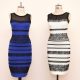 The two-tone dress, left, alongside an ivory and black version, made by Roman Originals, that has sparked a global debate on Twitter over what colour it is on display in Birmingham, England.