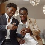 canva stock image_men looking at ipad