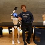 CEO Nathaneo Johnson with Robot