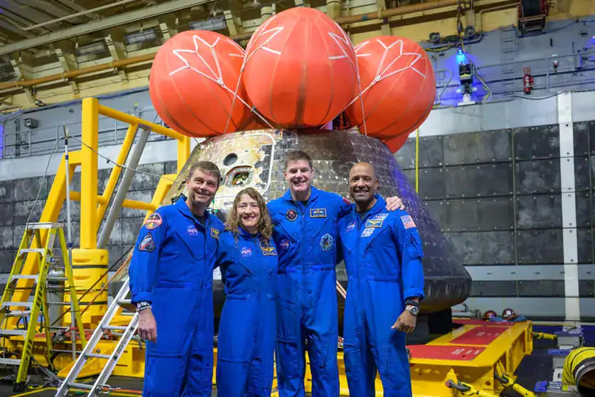 Artemis II crew: NASA astronauts Reid Wiseman, commander; left, Christina Koch, mission specialist; CSA (Canadian Space Agency) astronaut Jeremy Hansen, mission specialist; and NASA astronaut Victor Glover, Artemis II pilot, right, pose for a group photo. Photo Credit: (NASA/Bill Ingalls)