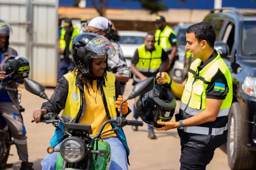 Founder of Spiro, Gagan Gupta, with a motorbike rider Source: Spiro