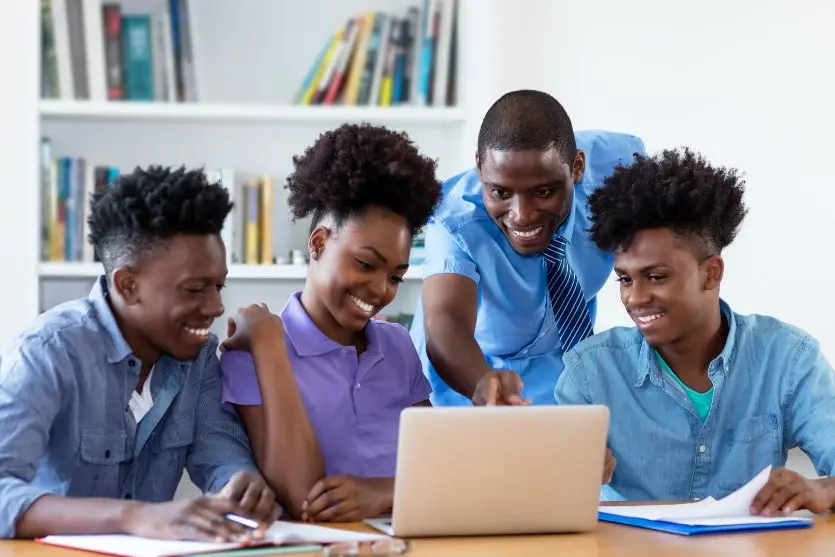 students using a laptop Source: Canva