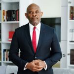 Tony Elumelu in a library